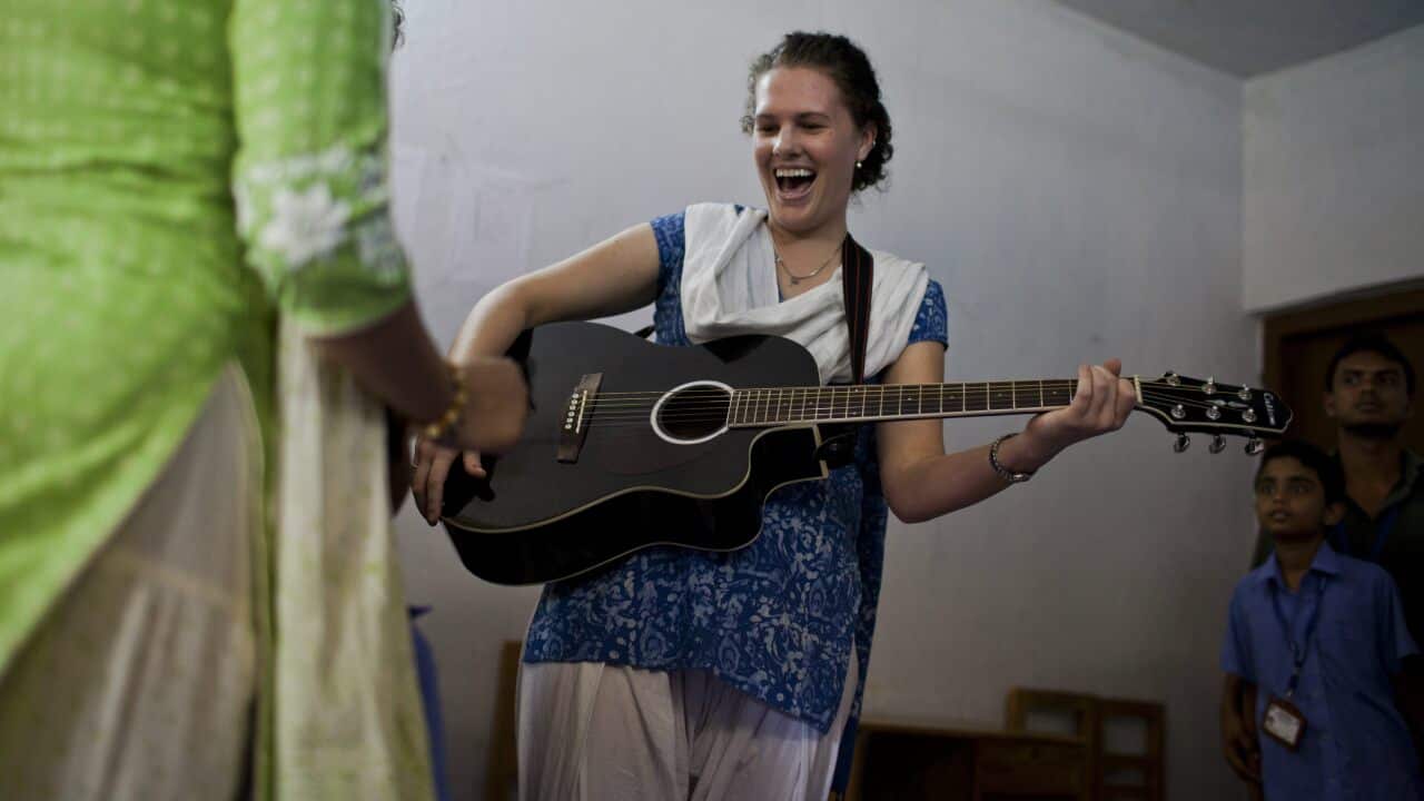 Girl playing tuba - Australia Explained – Learning an instrument