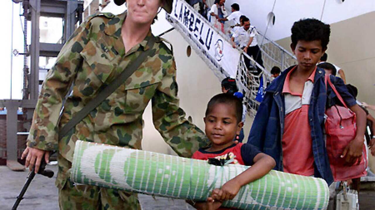 female_soldier_etimor_090909_ap_B_1784142346