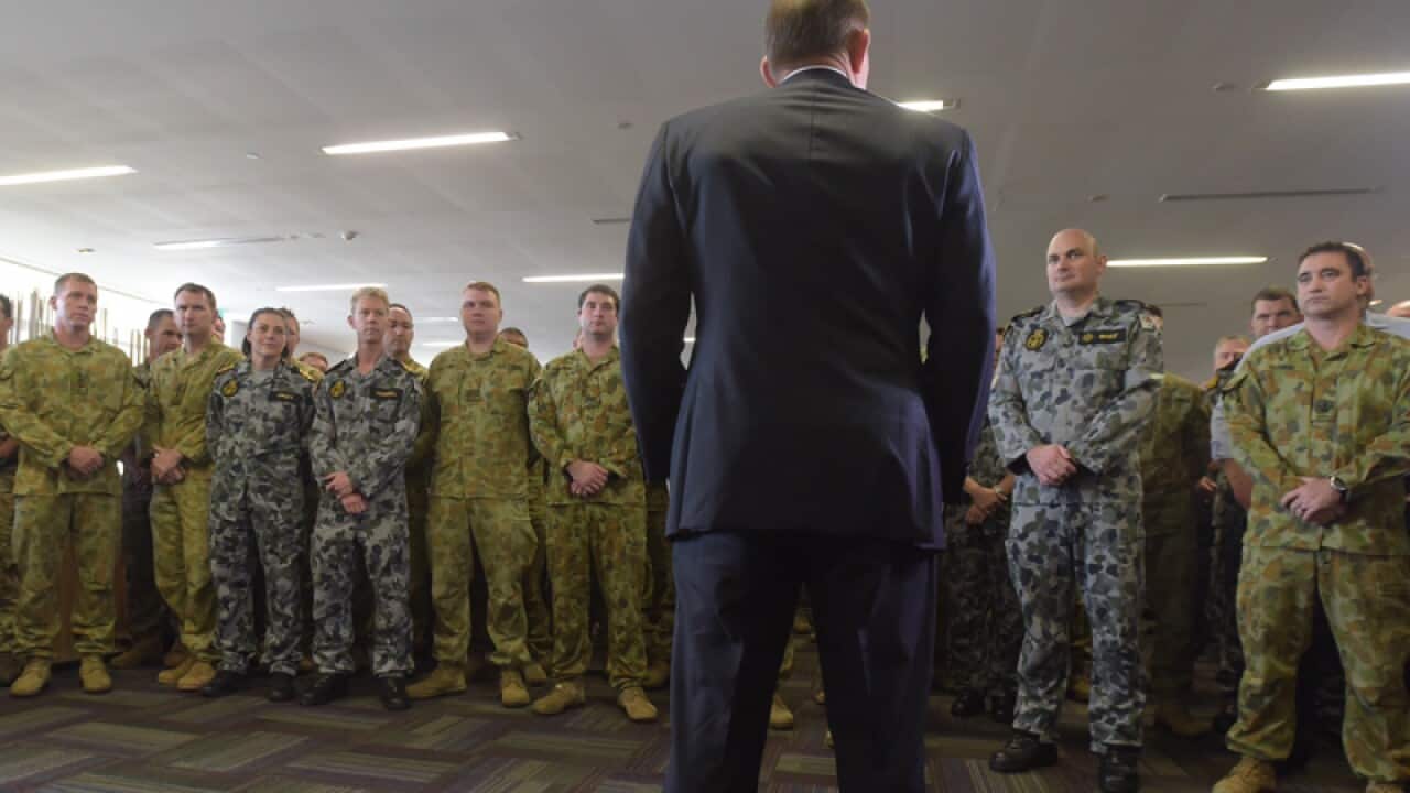 Tony Abbott speaks to troops at the Joint Operation Command Centre