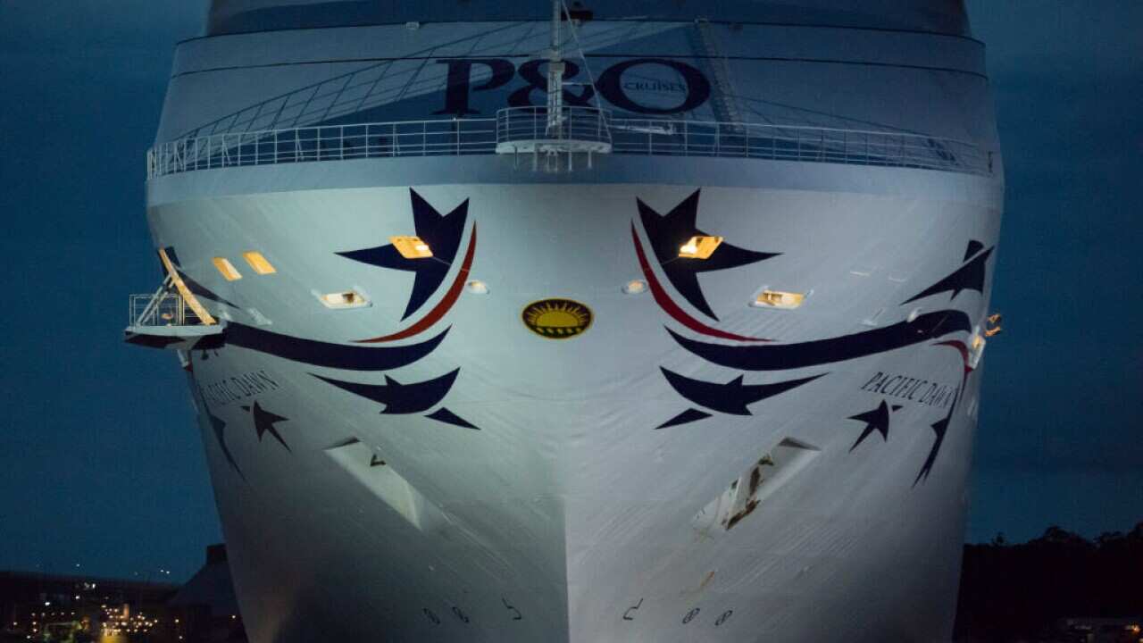 The Pacific Dawn cruise ship slips under the Gateway Bridge and into her berth on March 16, 2017 in Brisbane, Australia.