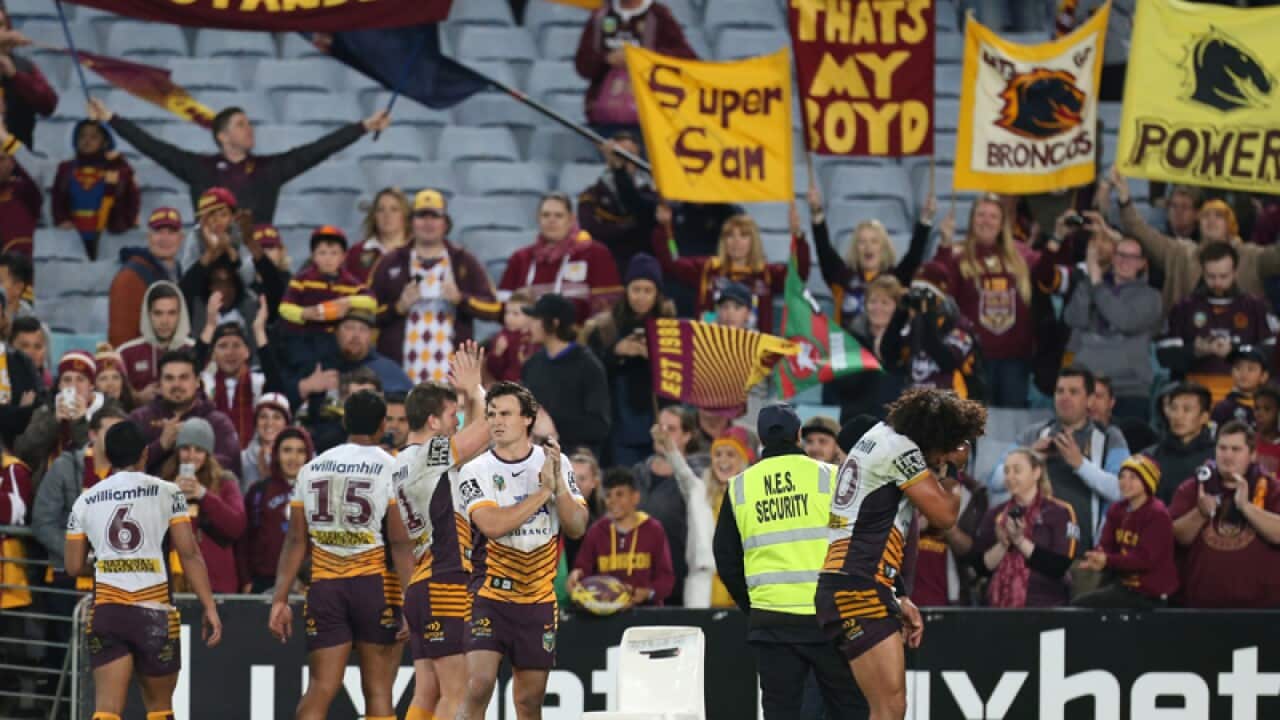 Brisbane Broncos fans and players celebrate