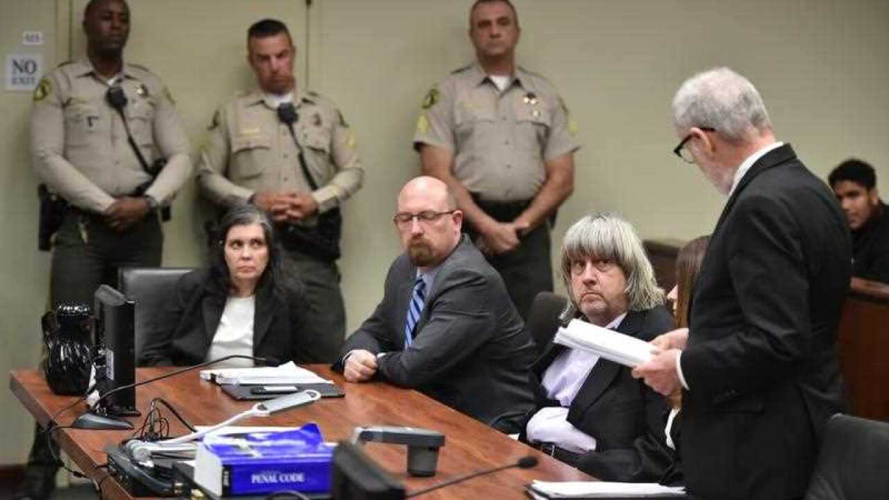 Louise Turpin (L) and attorney Jeff Moore (C) David Turpin (2-R) appear in court for arraignment on charges against the two in relation to their 13 malnourished children found chained in their home in Riverside, California, USA, 18 January 2018.
