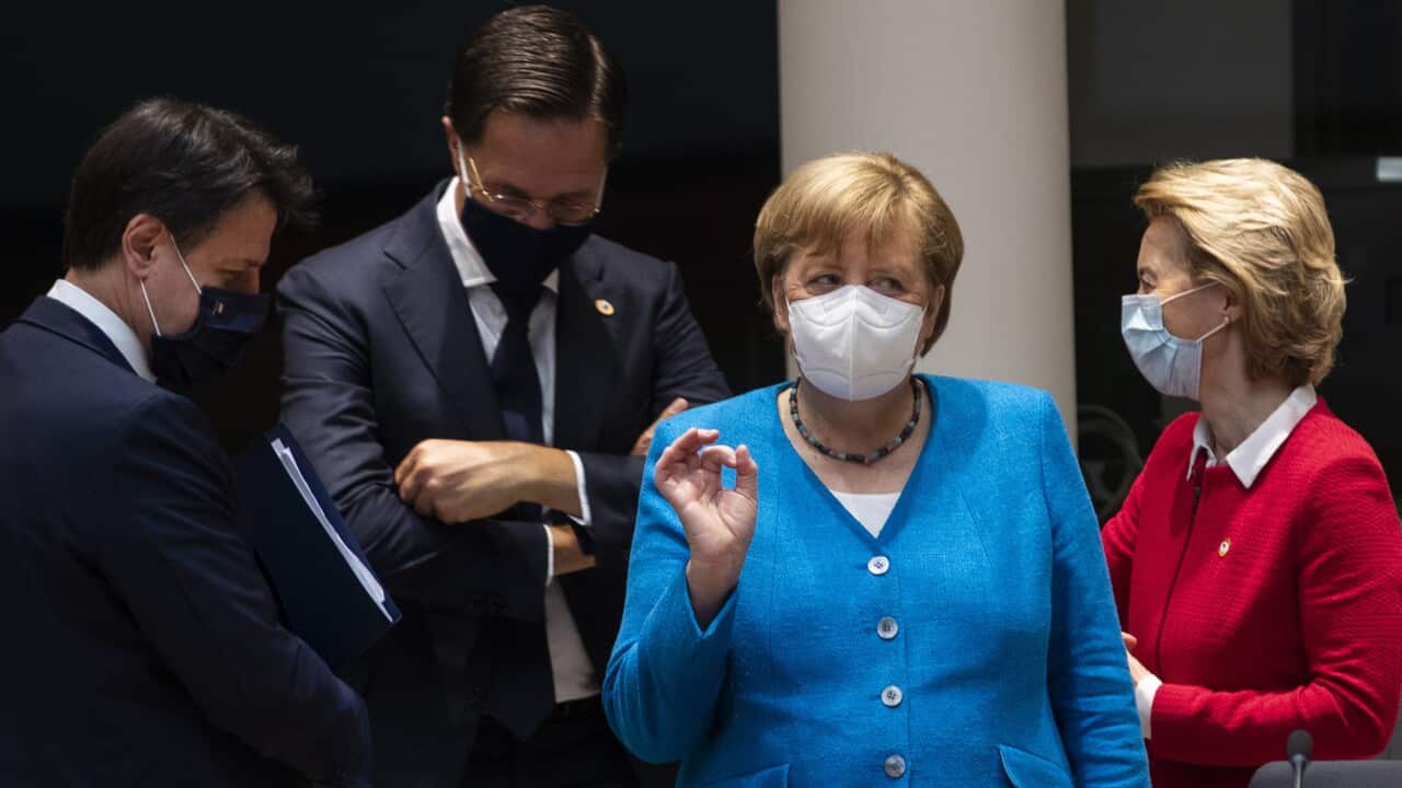 German Chancellor Angela Merkel, second right, speaks with from left, Italy's Prime Minister Giuseppe Conte, Dutch Prime Minister Mark Rutte and European Commission President Ursula von der Leyen.