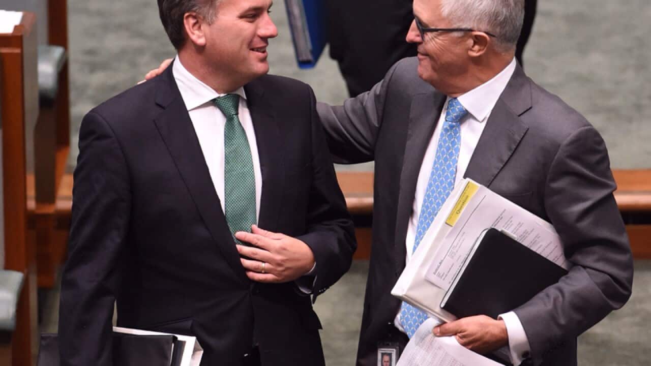 Former cabinet minister Jamie Briggs (L) with Malcolm Turnbull