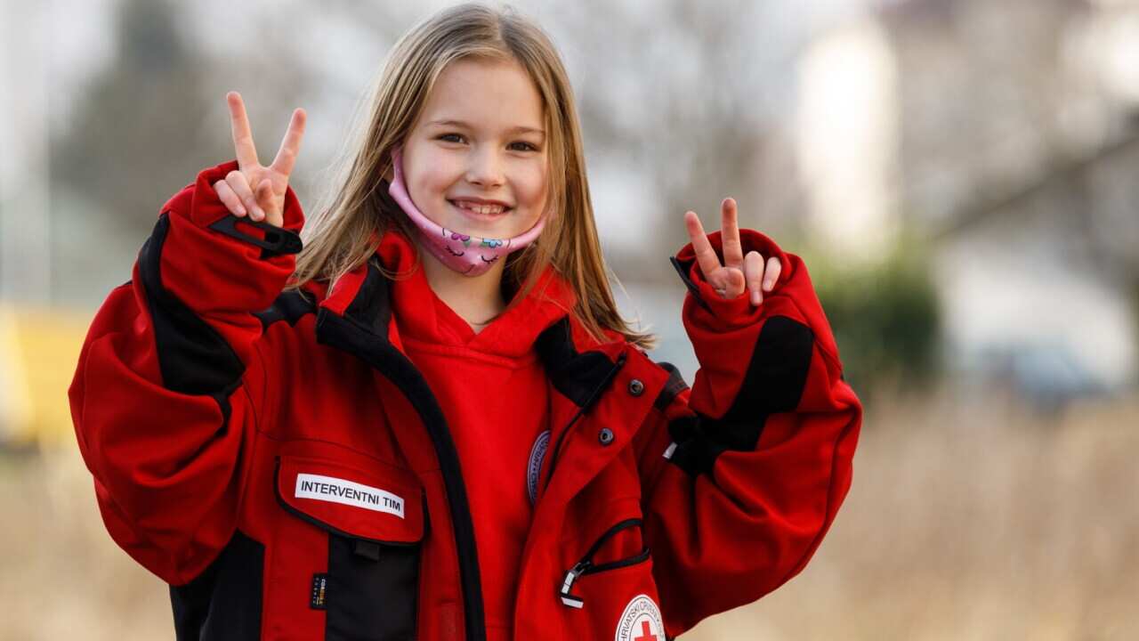 The youngest volunteer of the Croatian Red Cross, Iva Katinic photographed in the city society of the Red Cross in Dugo Selo, near Zagreb, Croatia