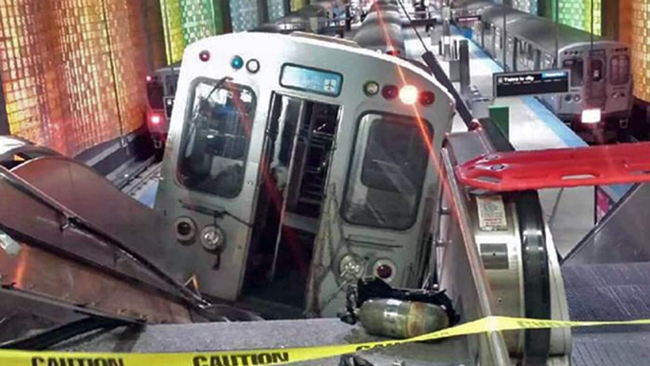 A Chicago train rests on an escalator at the O'Hare airport Atation.