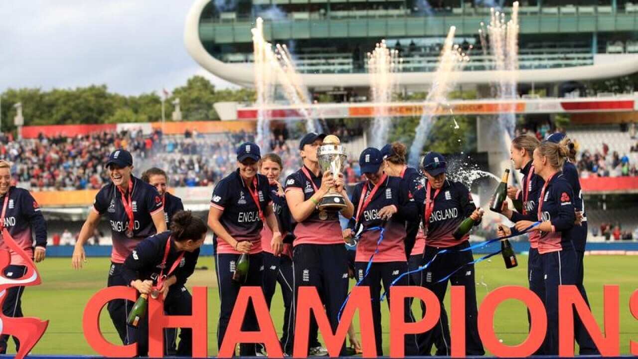 Heather Knight celebrates with the England team.