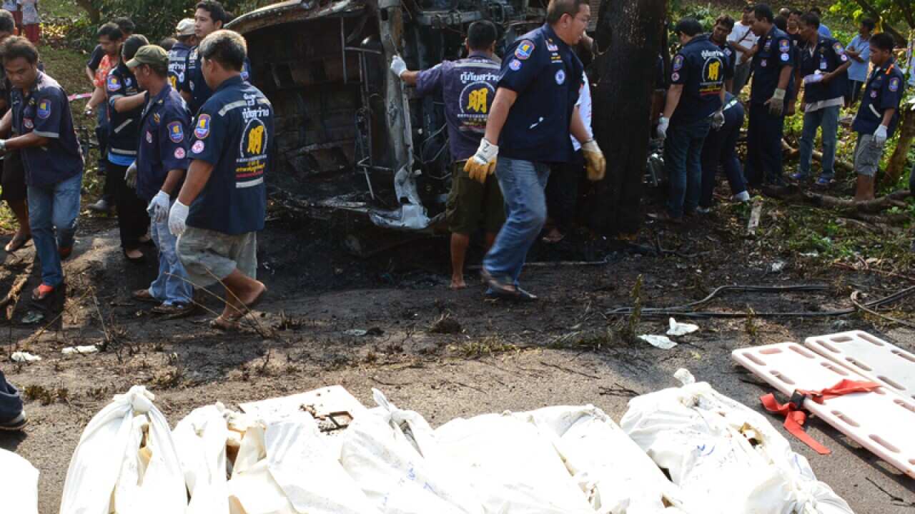 Rescue workers carry bodies of Cambodian migrant in Chanthaburi