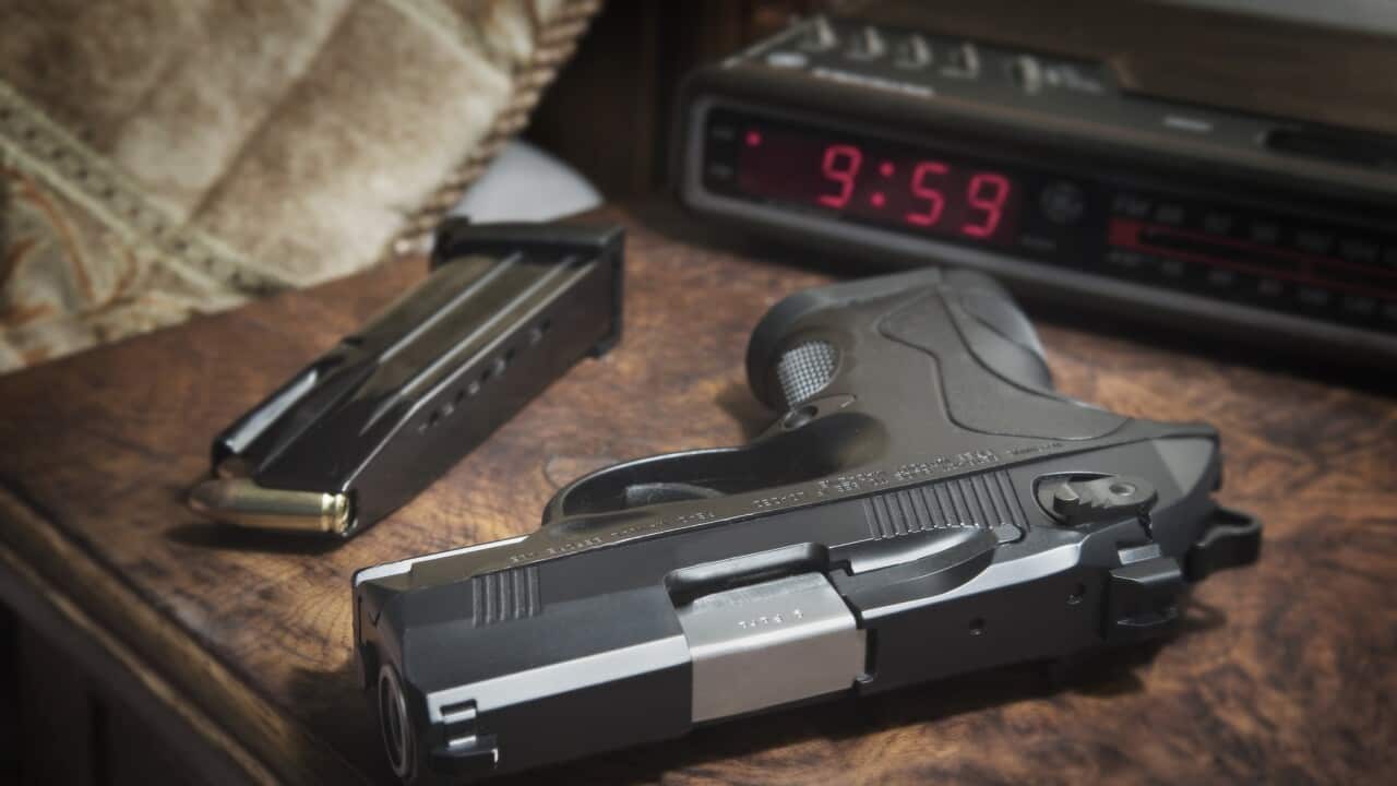 pistol on bedside nightstand