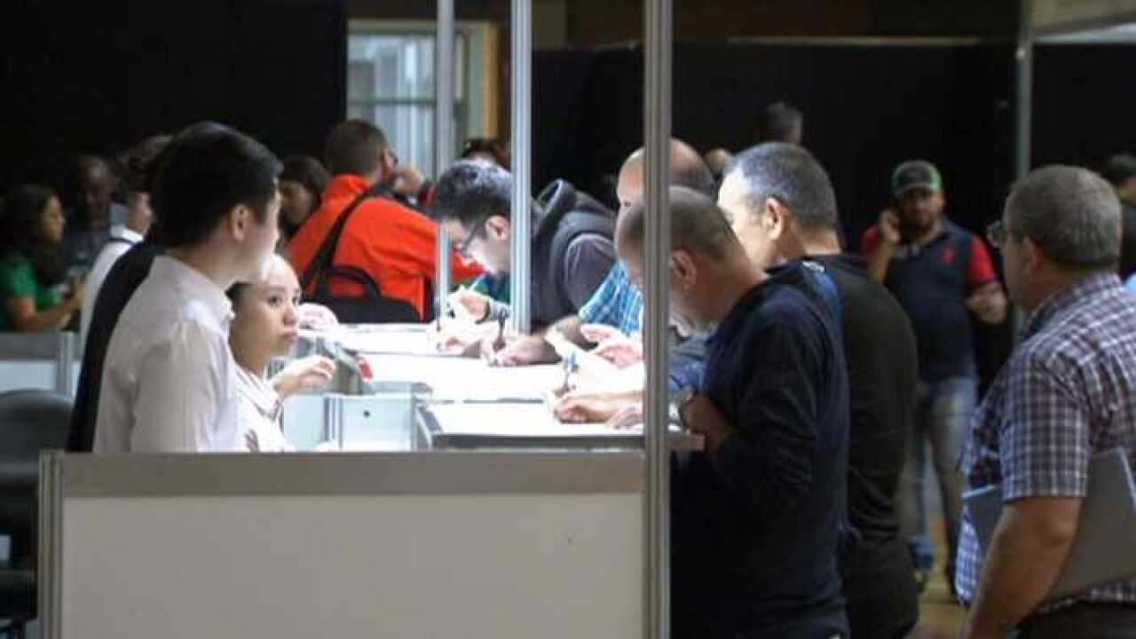 Refugees meet potential employers at job expo