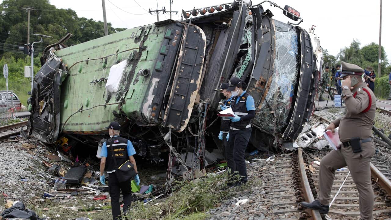 At least 18 people were killed after a bus heading to a Buddhist temple has collided with a train in central Thailand.