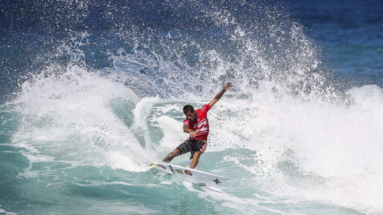 Filipe Toledo in Heat 9 of Round One at the Billabong Pipe Masters