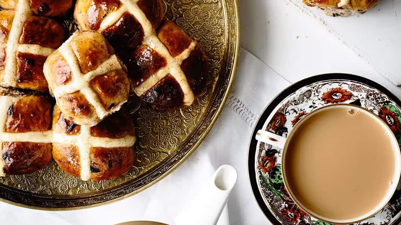 Hot cross buns on a plate
