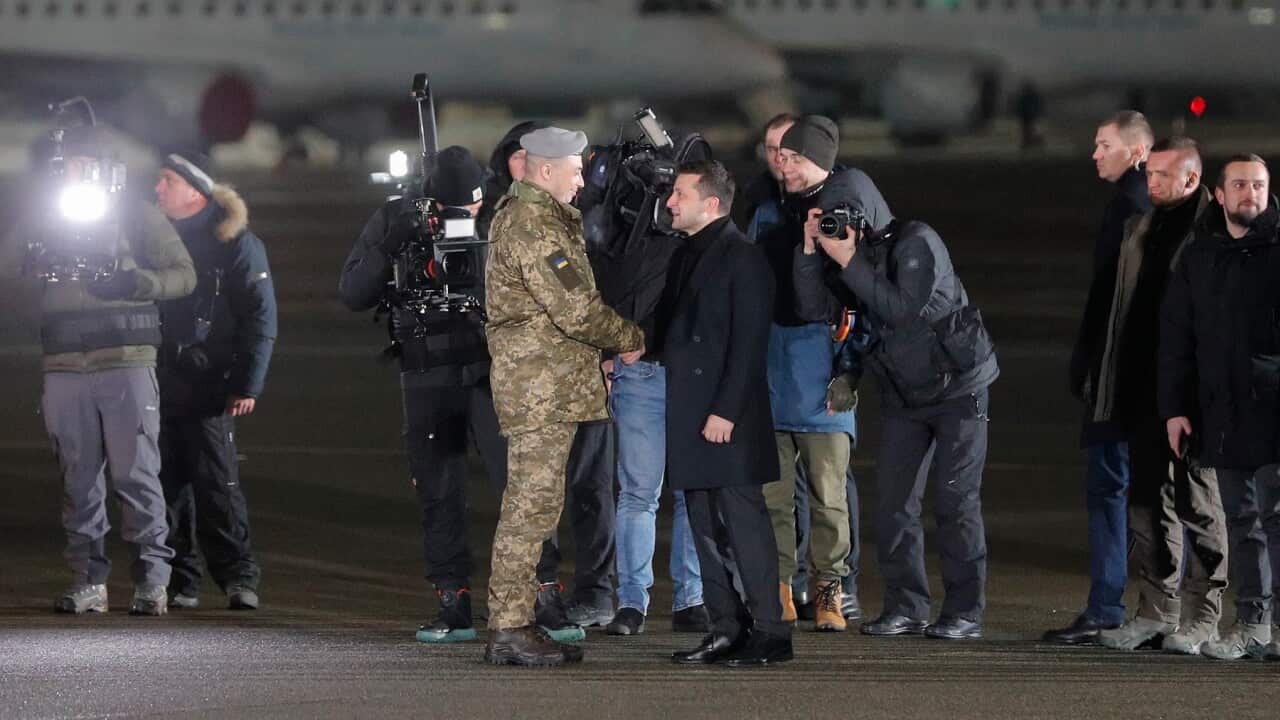 Ukrainian President Volodymyr Zelensky meets the released Ukrainian captives (AAP)