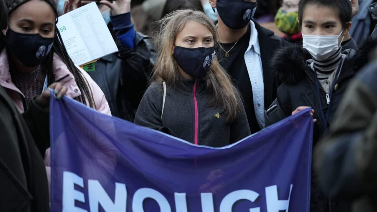 Climate change activist Greta Thunberg takes part in Fridays For Future protest near the COP26 venue.