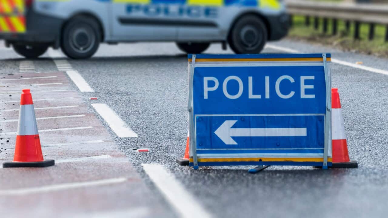 Police Sign on Road with Police Van