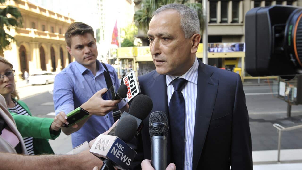 Muslim Community Leader Dr Jamal Rifi arrives at the Supreme Court in Sydney, Friday, Dec. 11, 2015. The Party for Freedom group is planning a rally to mark the 10th anniversary of the Cronulla riots. (AAP Image/Joel Carrett) NO ARCHIVING