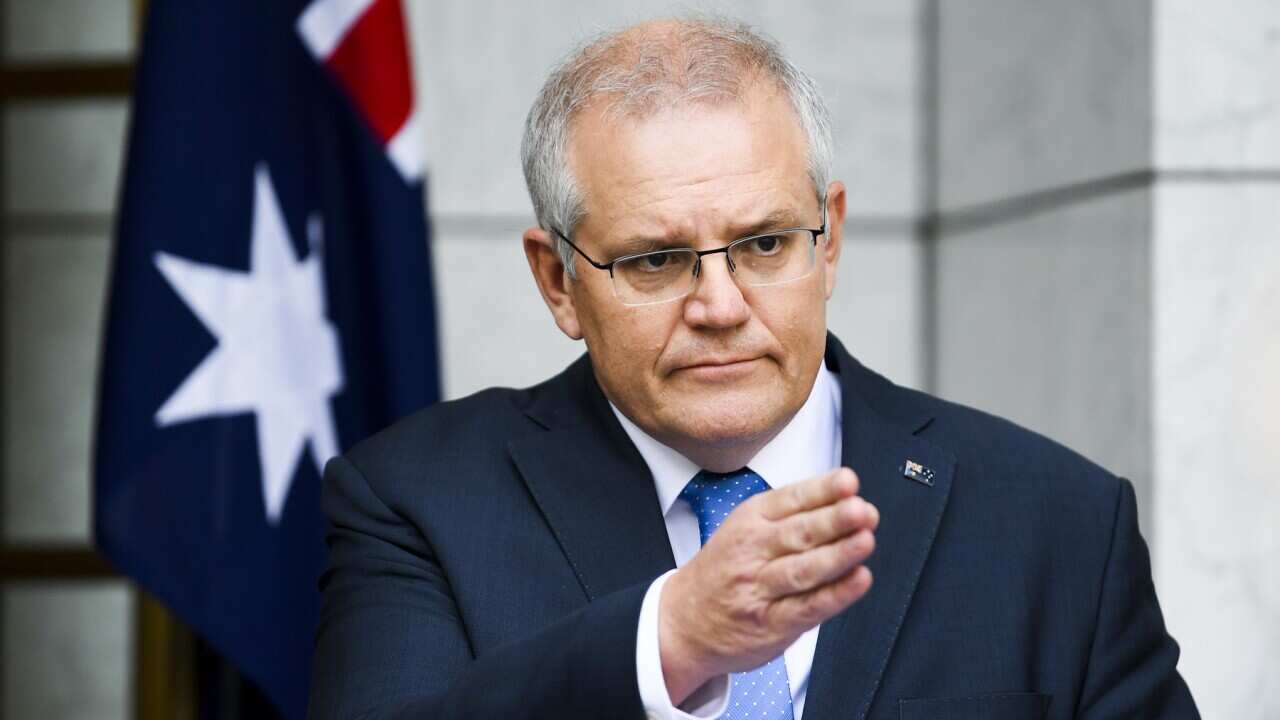 Australian Prime Minister Scott Morrison speaks to the media during a press conference following a national cabinet meeting, at Parliament House in Canberra, Friday, July 2, 2021. (AAP Image/Lukas Coch) NO ARCHIVING