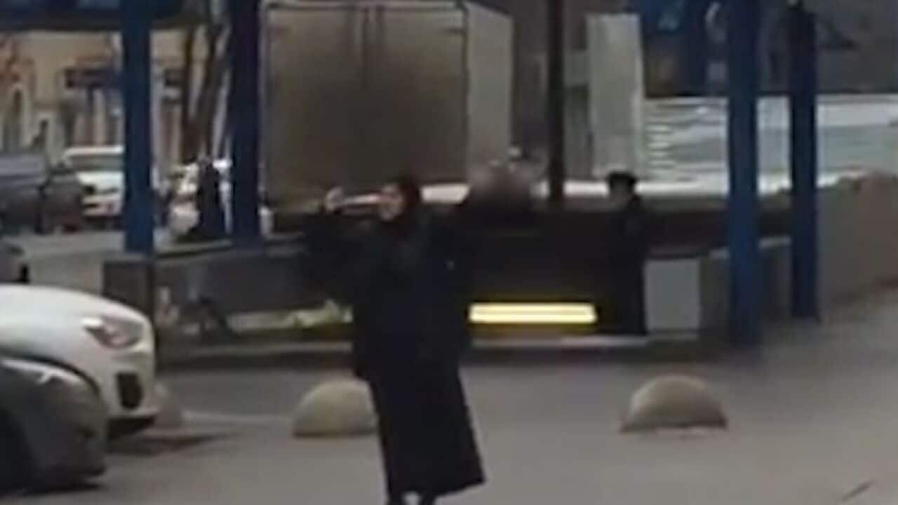 Russian woman carrying severed head shouts 'I am a terrorist'