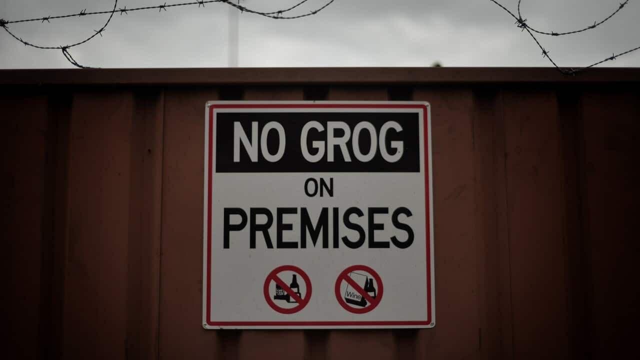 A sign reading No Grog (alcohol) in Alice Springs.