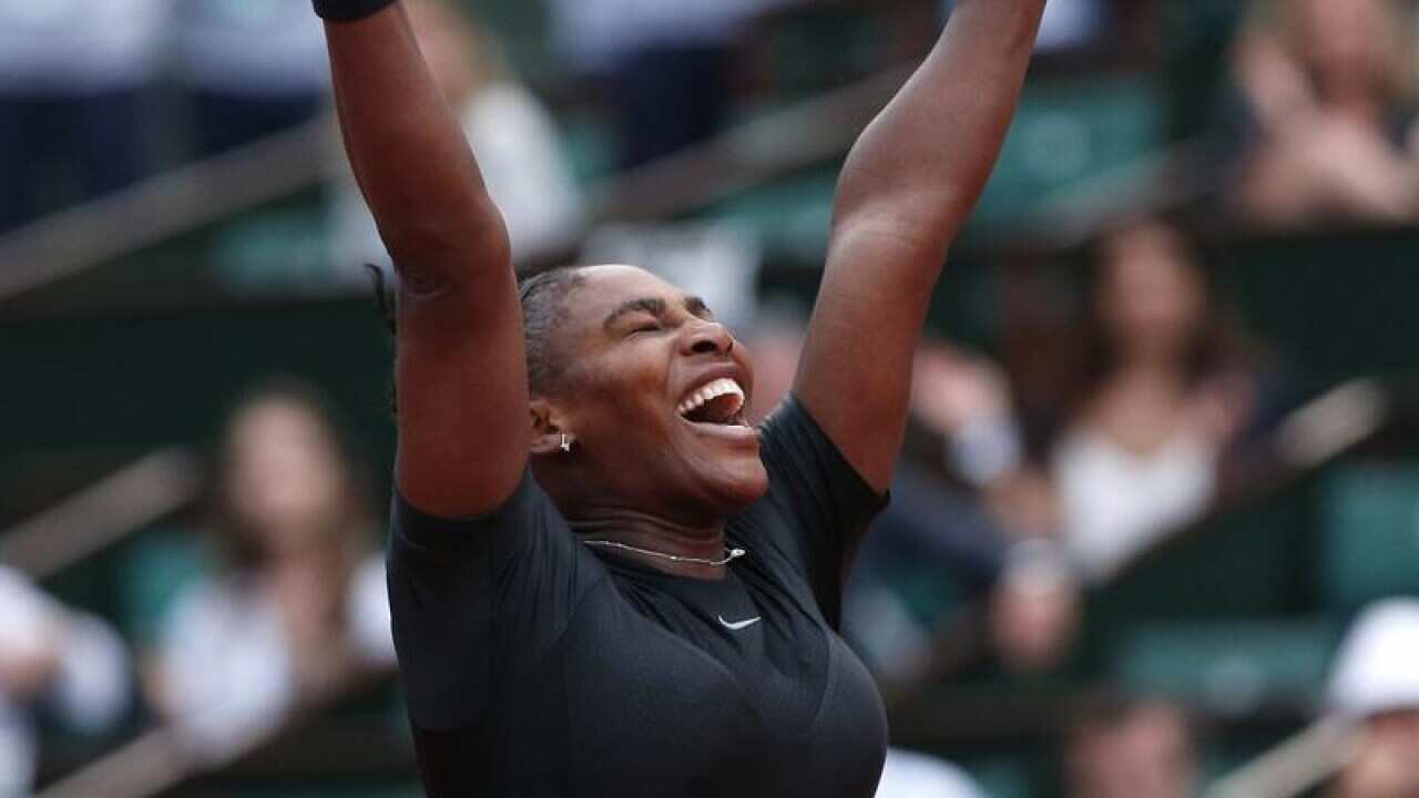Serena Williams celebrates after winning her match