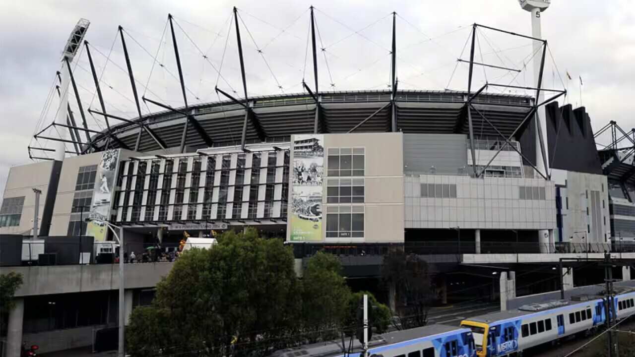 Officers say they have arrested two men who were allegedly armed while at the MCG