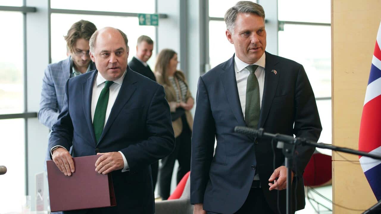 UK Defence Secretary Ben Wallace (left) and Australian Deputy Prime Minister Richard Marles at BAE systems in the UK industrial town of Barrow-in-Furness.