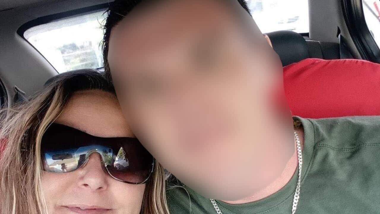 Belinda Beale with partner who is incarcerated.