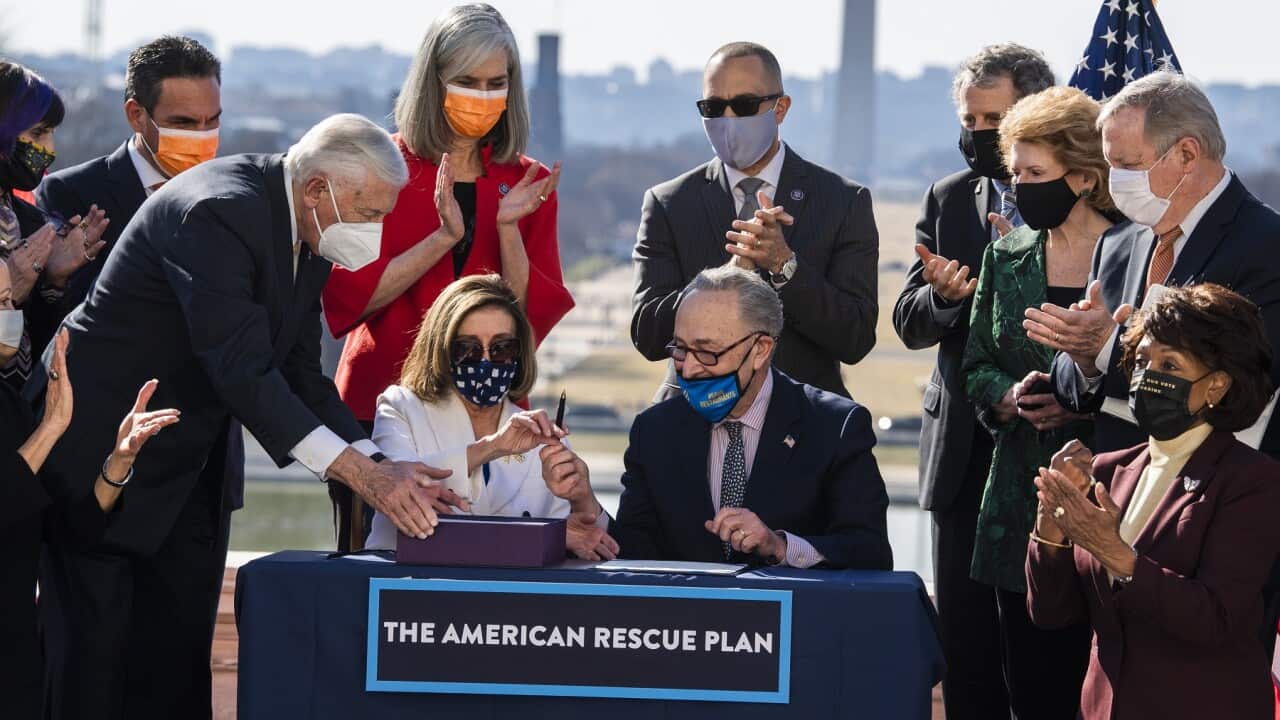 The American Rescue Plan Act is signed in Washington