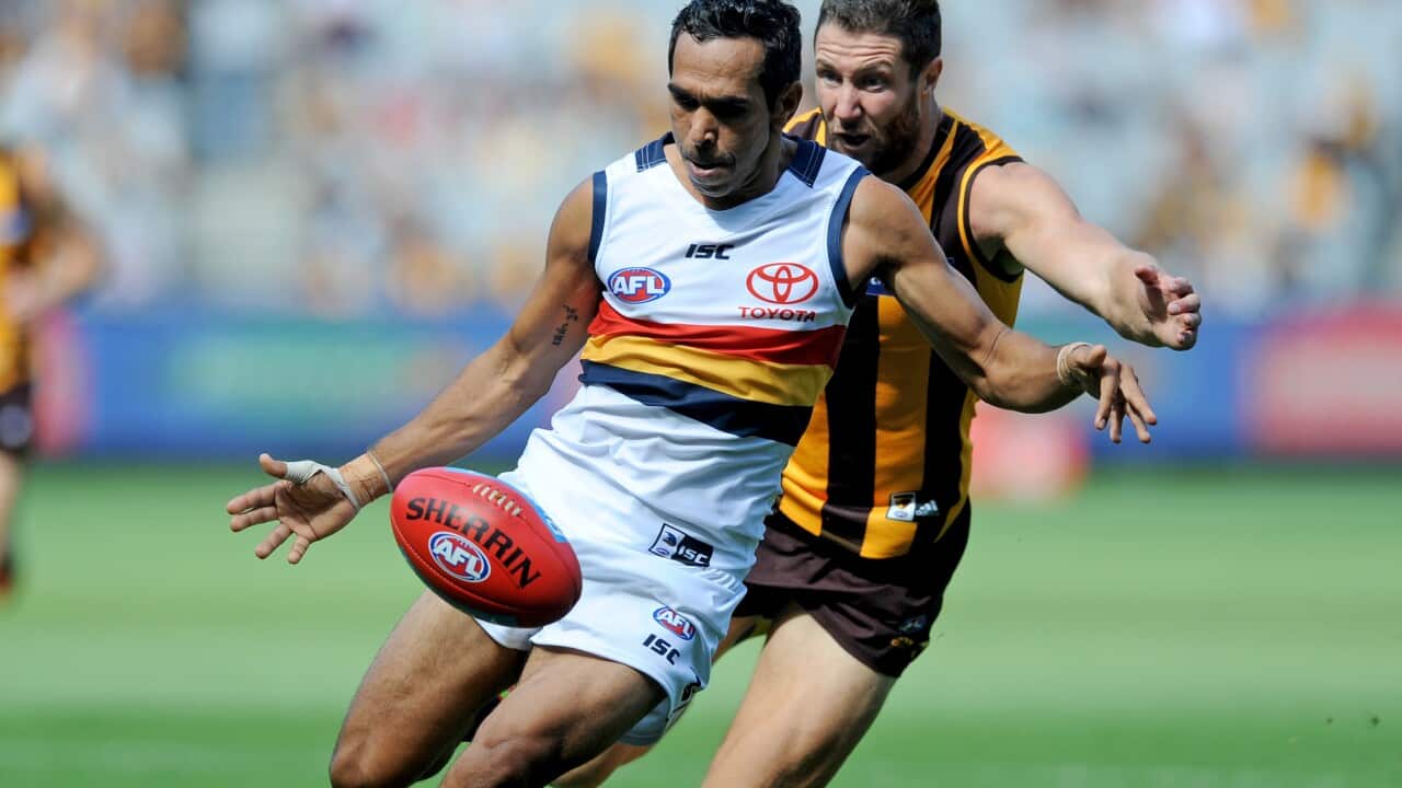 Eddie Betts of the Crows outruns James Frawley of the Hawks, during the Round 2 AFL match between the Hawthorn Hawks and the Adelaide Crows at the MCG in Melbourne, Saturday, April 1, 2017. (AAP Image/Joe Castro) NO ARCHIVING, EDITORIAL USE ONLY