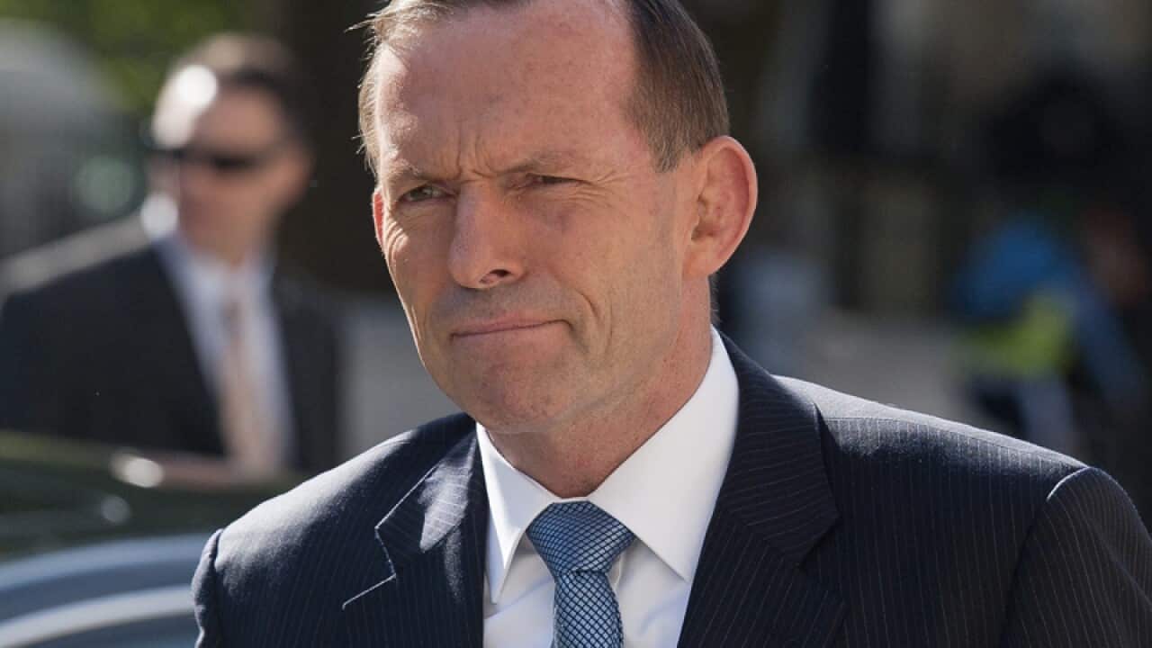 Tony Abbott arrives at the Cabinet Office in London.