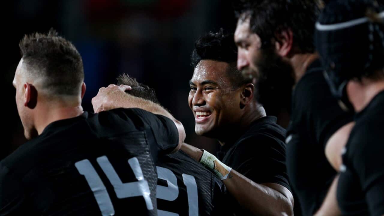 Julian Savea of New Zealand celebrates with team mates