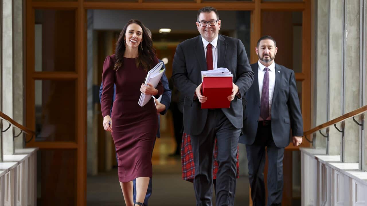 New Zealand Prime Minister Jacinda Ardern and Finance Minister Grant Robertson at Parliament during budget day on 20 May.