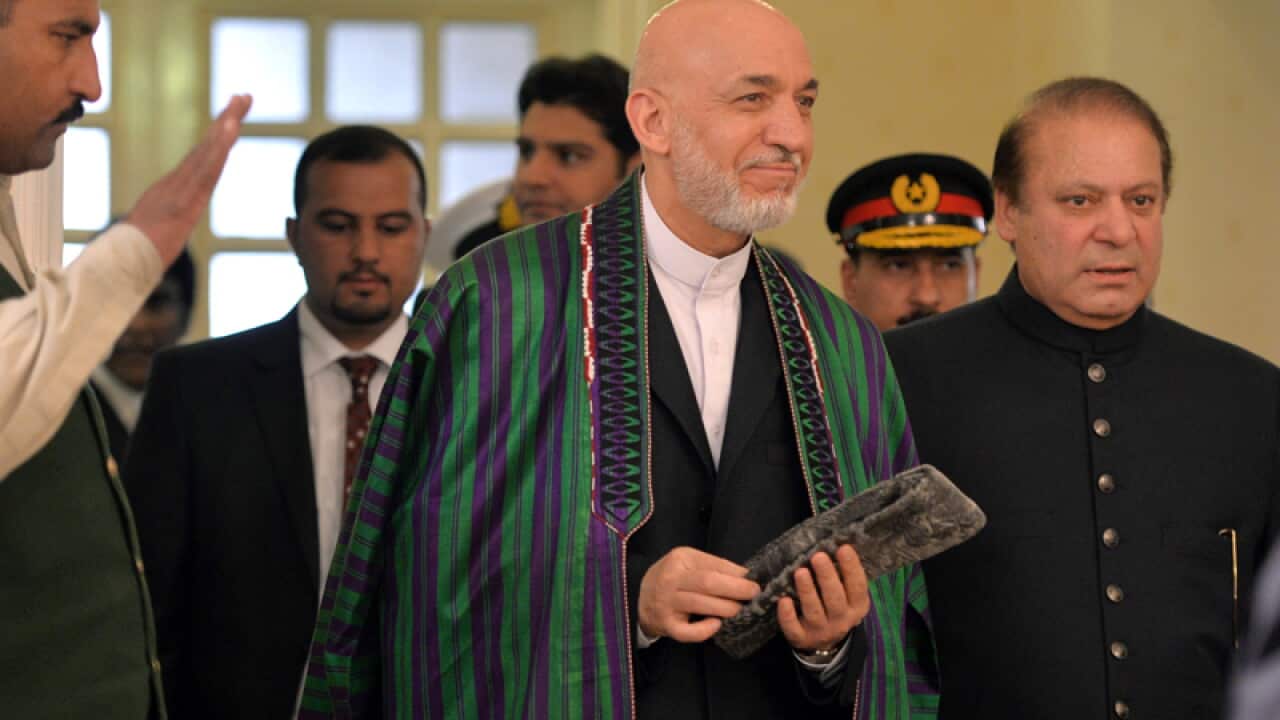 Afghan President Hamid Karzai (C) and Pakistani PM Nawaz Sharif