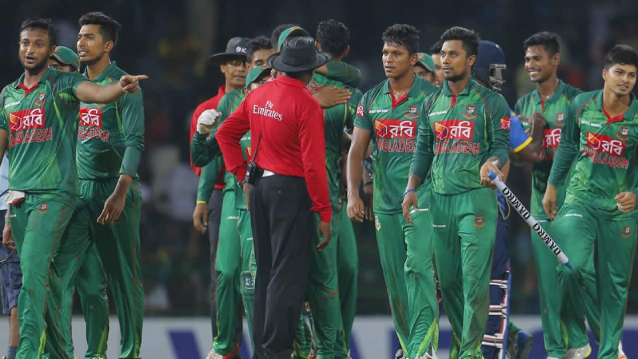 Bangladeshi team members celebrate their victory over Sri Lanka