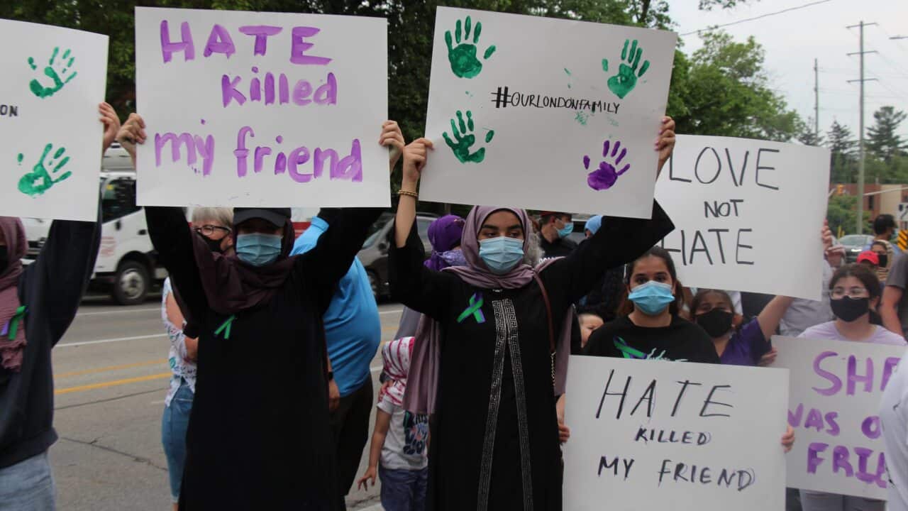 People attend a vigil held for the family in London, Ontario on 8 June, 2021.