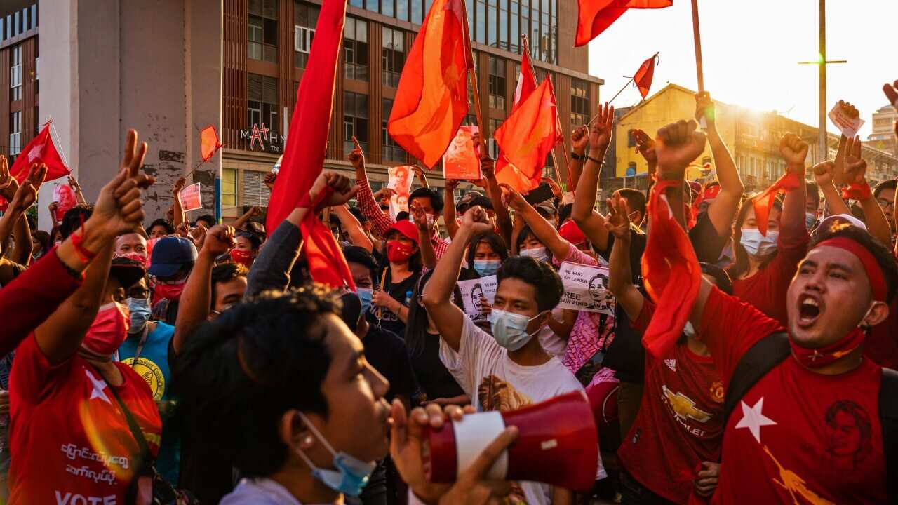 Protesters protest against the military coup in downtown Yangon, Myanmar.