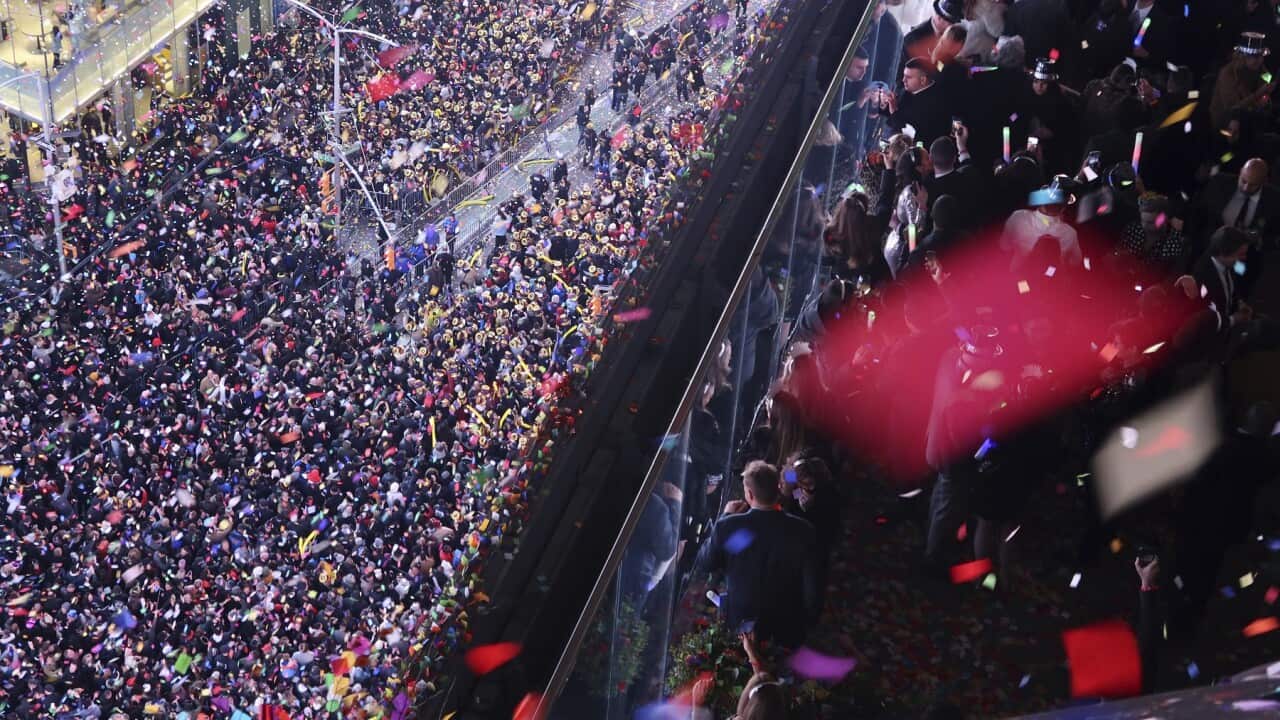 Confetti and pre-social distancing crowds greet 2020 in New York's Times Square