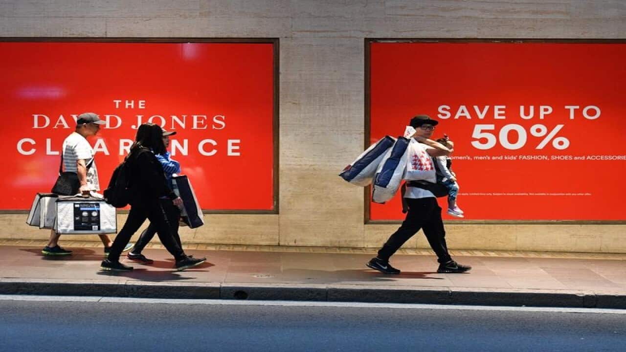 Shoppers are seen outside the David Jones department store