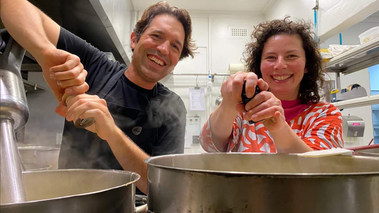 Ben Shrewry and Dani Valent are up early to cook for workers.