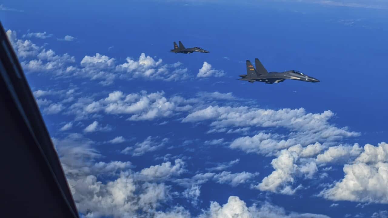 Chinese fighter jets conduct a joint combat training exercises