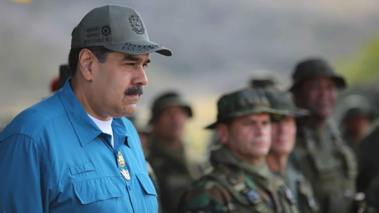 Venezuelan President Nicolas Maduro with members of the military.