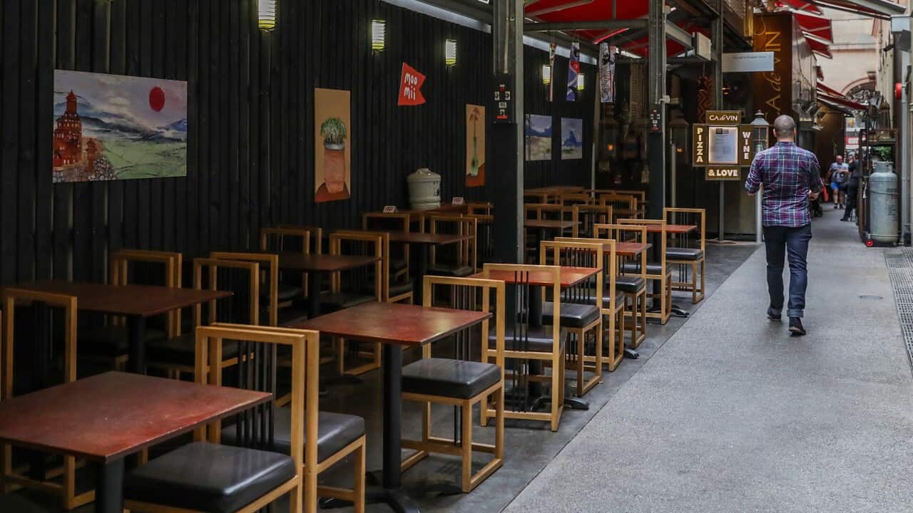 Unoccupied dining tables and chairs at a restaurant in the central business district during lunch on March 18, 2020 in Melbourne, Australia.