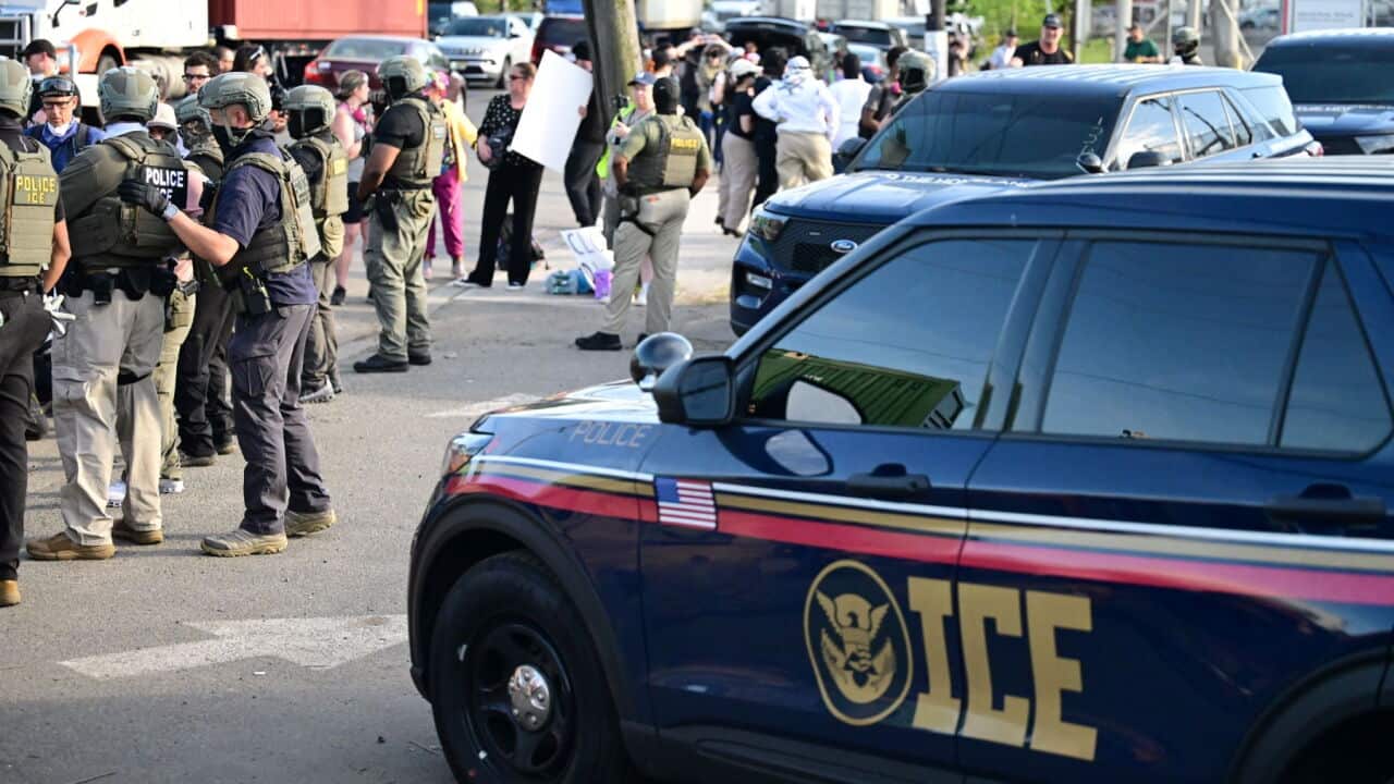 Protesters in a stand-off with federal Immigration and Customs Enforcement (ICE) agents outside the Delaney Hall immigration detention centre (Photo by Kyle Mazza-Sipa USA).jpg