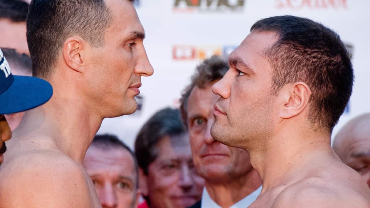 Bulgarian boxer Kubrat Pulev (R) and Ukrainian Wladimir Klitschko