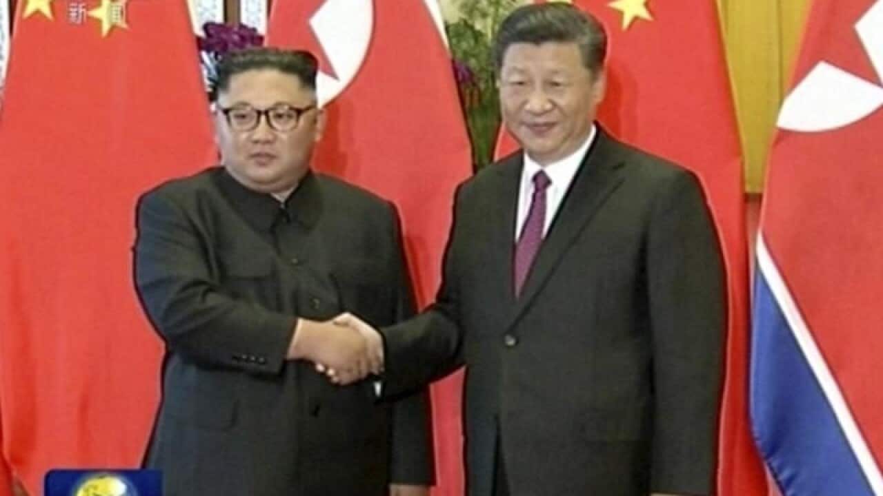 Chinese President Xi Jinping and North Korean leader Kim Jong Un.
