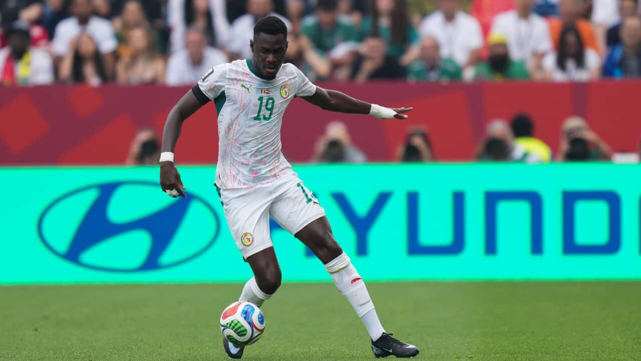 Moussa Niakhate of Senegal drives the ball forward during the 2026 FIFA World Cup Group I match between Senegal and Iraq at Toronto Stadium. on June 26, 2026 in Toronto, Canada