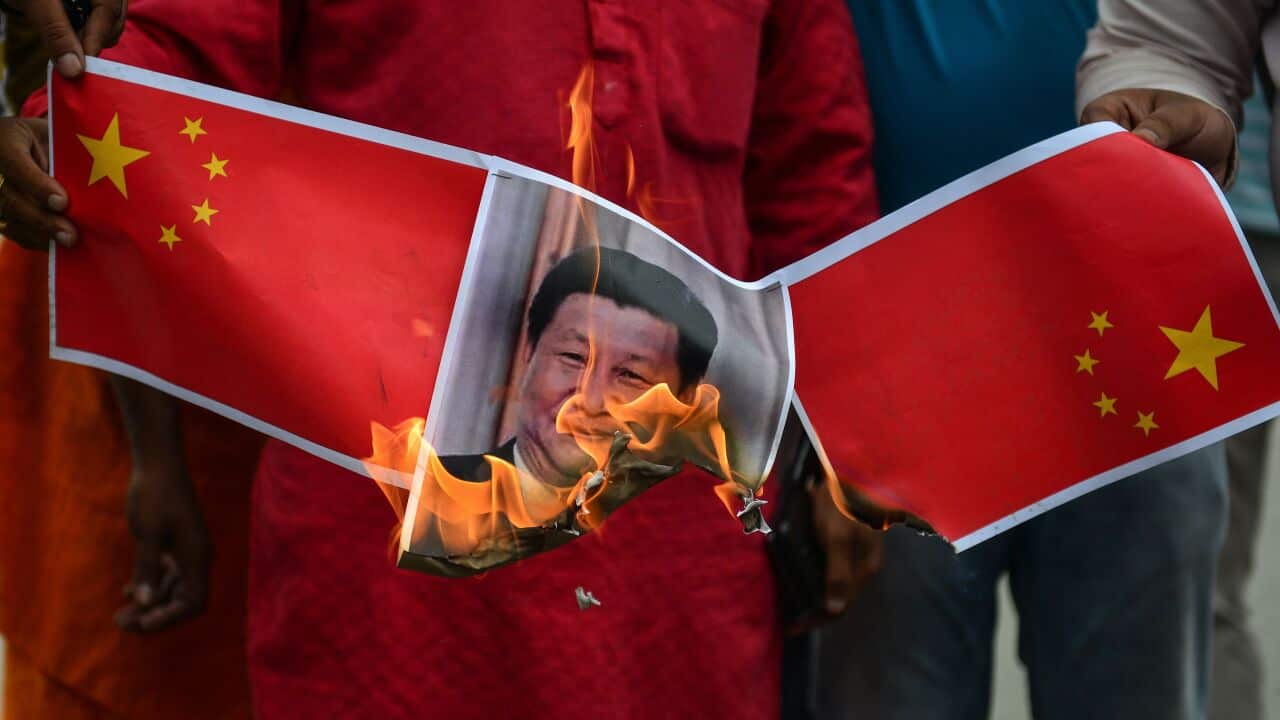 Bharatiya Janata Party (BJP) supporters burn posters and effigy of Chinese President Xi Jinping during an anti-China protest in India, June 2020.