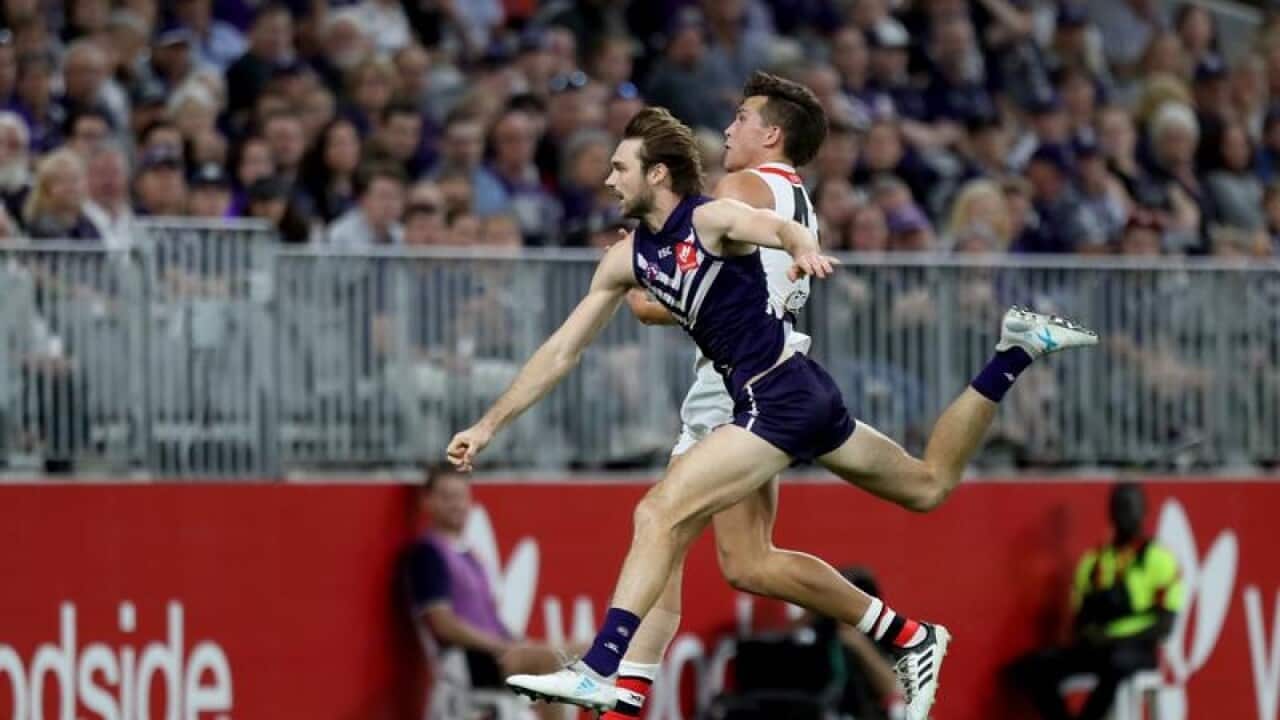 Joel Hamling of the Dockers and Rowan Marshall of the Saints.