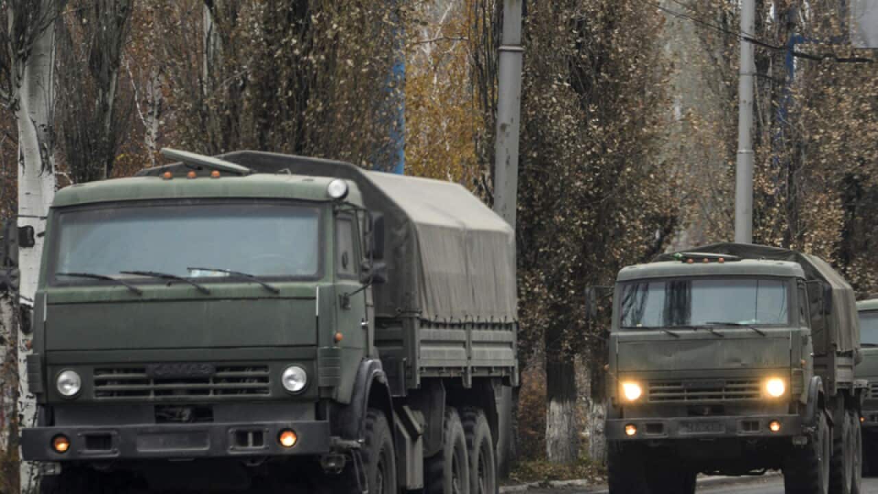 A convoy of Military vehicles.
